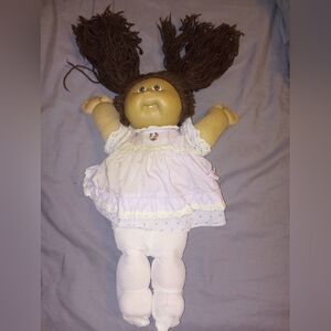 Vintage Cabbage patch doll with her original clothes.
